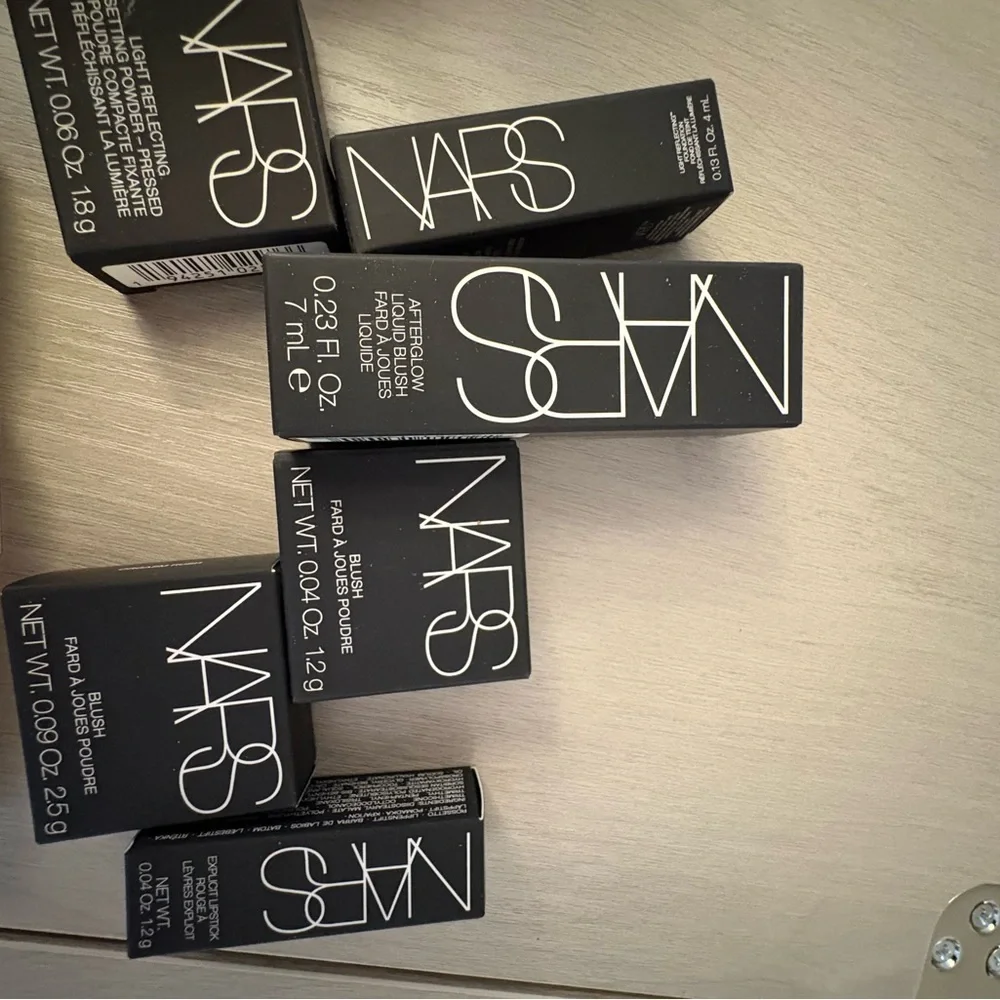 Dior silver  Cosmetic Pouch with Nars cosmetics‎ inside